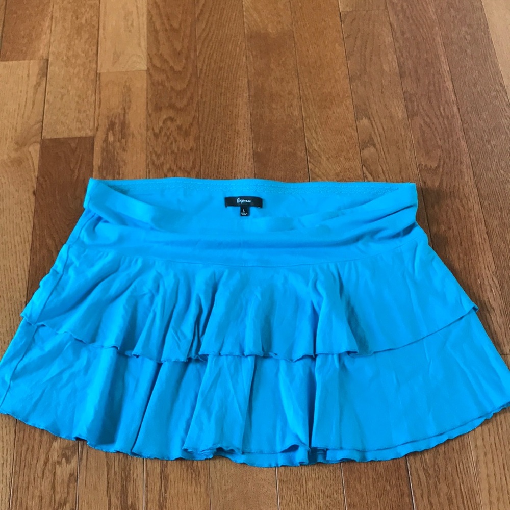 Express fun and flirty blue ruffled skirt size L